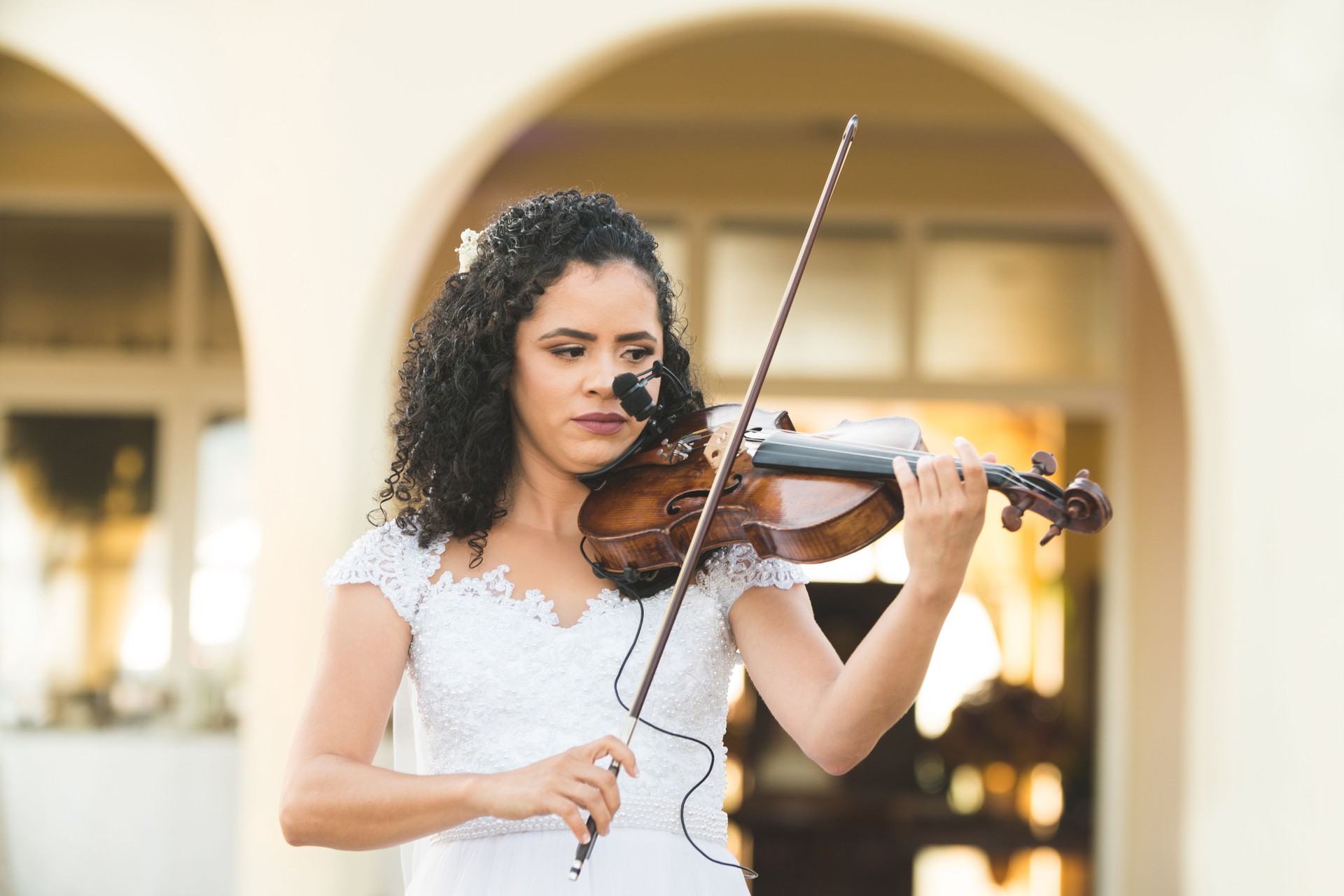 Bride enters the ceremony playing the violin