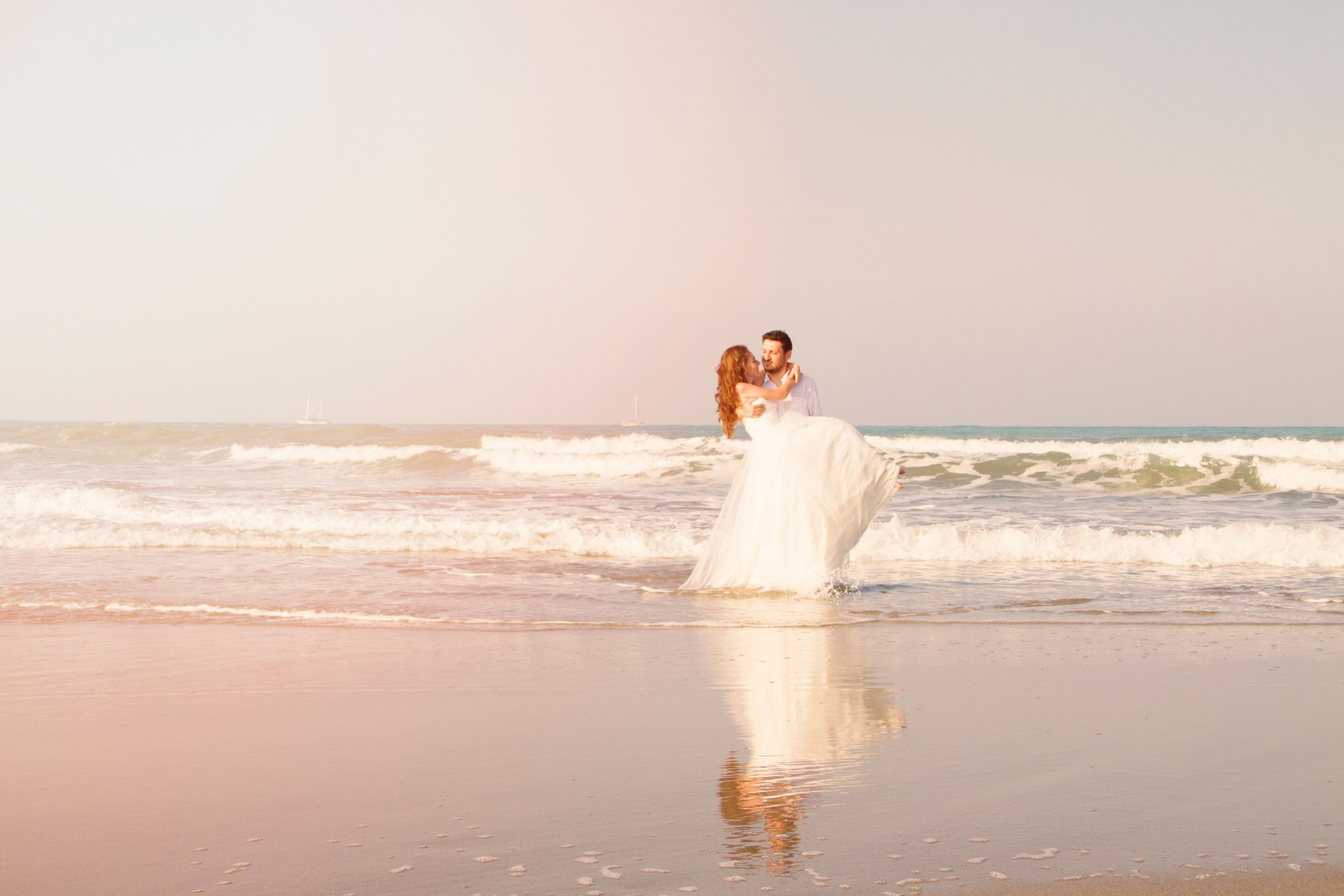 Bride and groom at beach