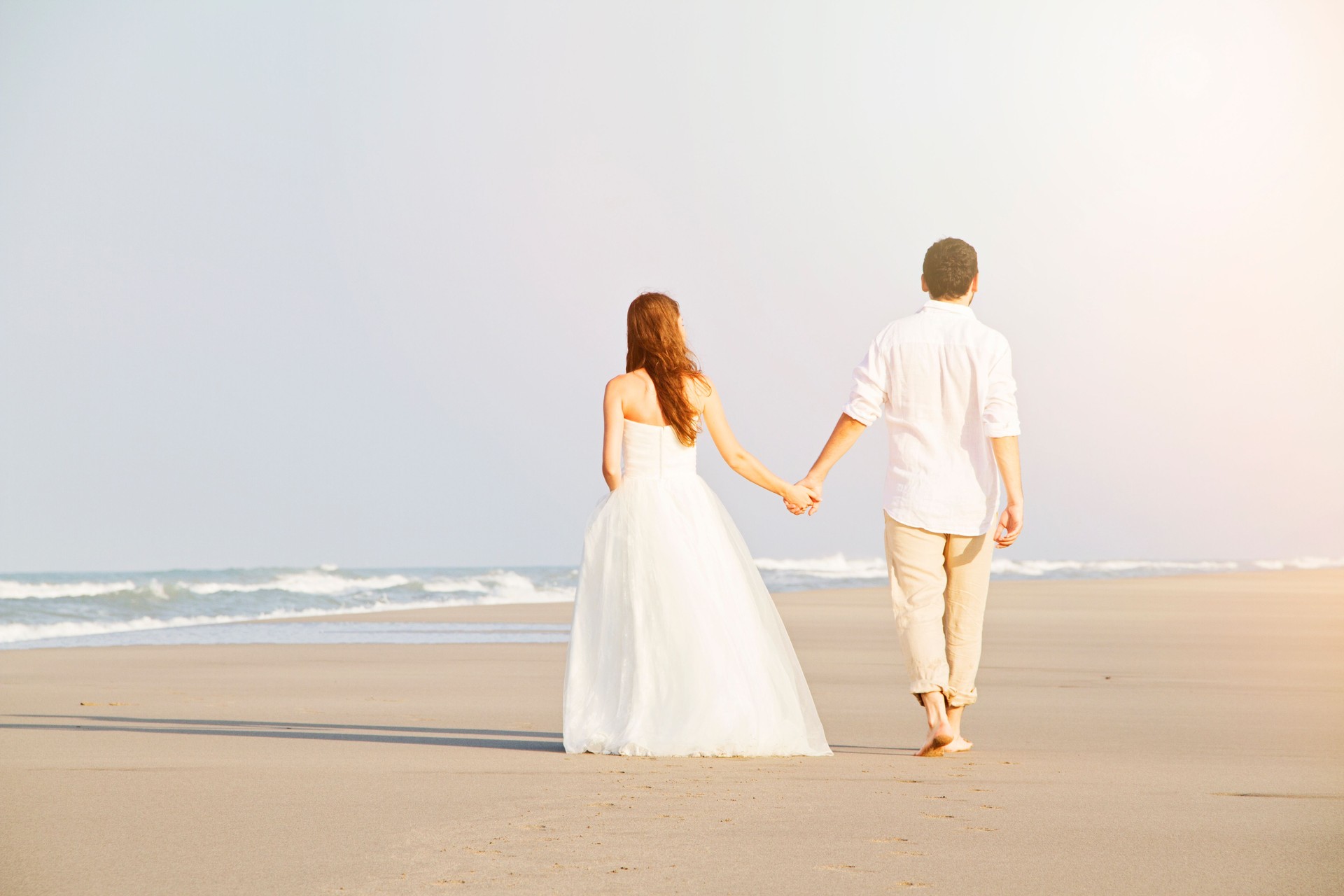 Bride and groom at beach